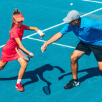 Tennis professionals on court