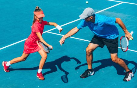 Tennis professionals on court